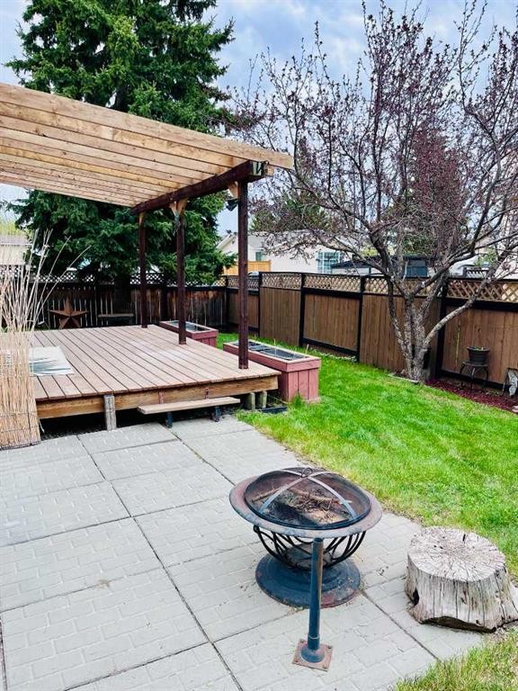 109 Downey Place, Okotoks, AB - Outdoor With Deck Patio Veranda With Backyard