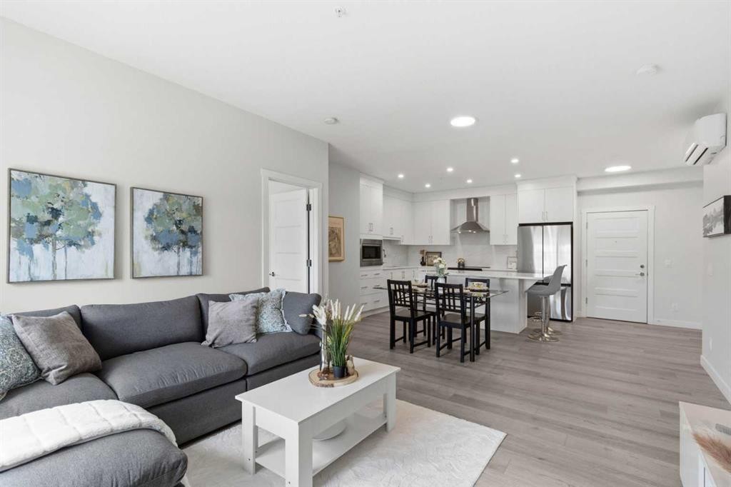 1306-81 Arbour Lake View Nw, Calgary, AB - Indoor Photo Showing Living Room