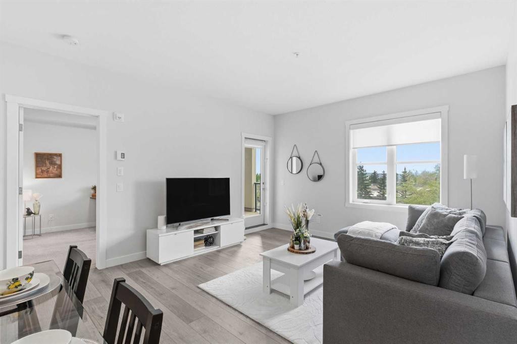1306-81 Arbour Lake View Nw, Calgary, AB - Indoor Photo Showing Living Room