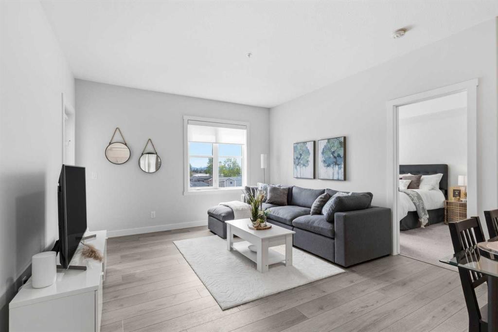 1306-81 Arbour Lake View Nw, Calgary, AB - Indoor Photo Showing Living Room