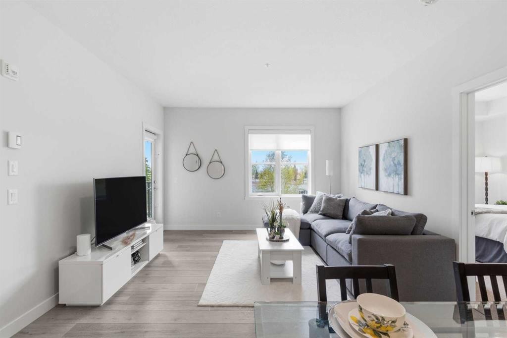 1306-81 Arbour Lake View Nw, Calgary, AB - Indoor Photo Showing Living Room