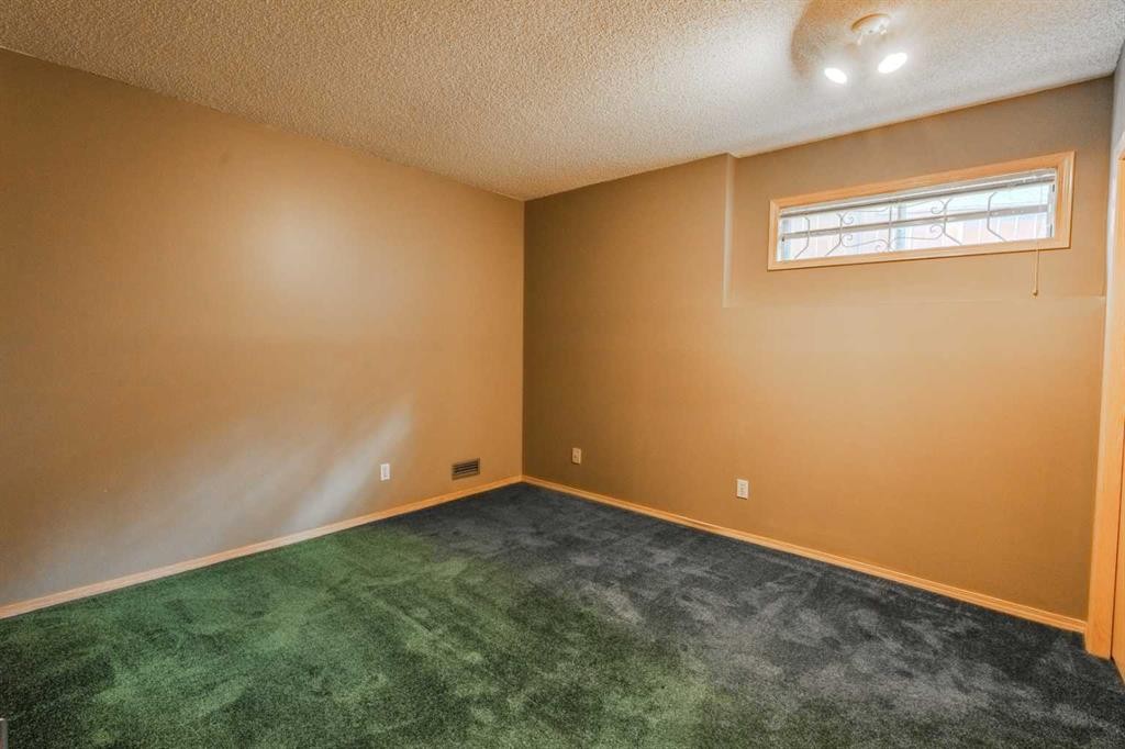 135 Canterbury Court Sw, Calgary, AB - Indoor Photo Showing Other Room