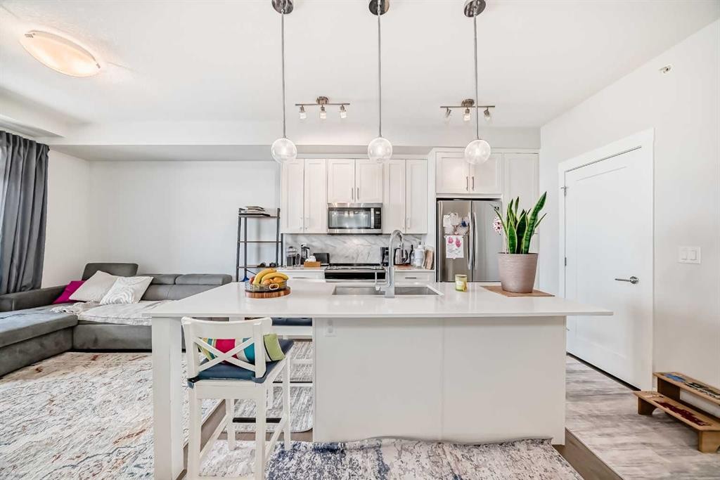 415-300 Auburn Meadows Common Se, Calgary, AB - Indoor Photo Showing Kitchen With Stainless Steel Kitchen With Double Sink With Upgraded Kitchen