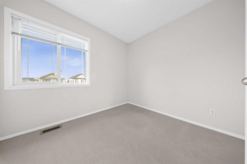 104 Copperstone Terrace Se, Calgary, AB - Indoor Photo Showing Other Room