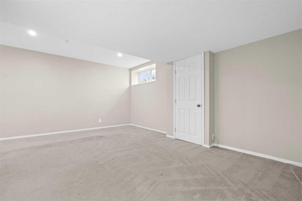 104 Copperstone Terrace Se, Calgary, AB - Indoor Photo Showing Other Room