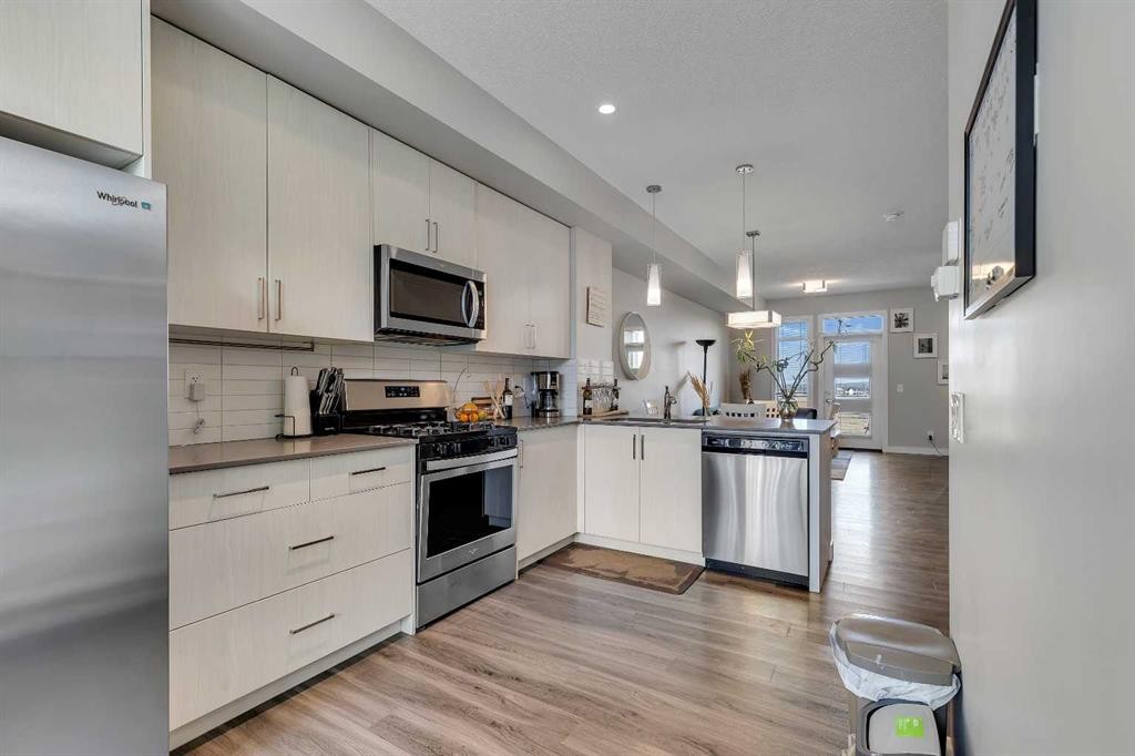 154 Seton Passage Se, Calgary, AB - Indoor Photo Showing Kitchen With Stainless Steel Kitchen With Upgraded Kitchen