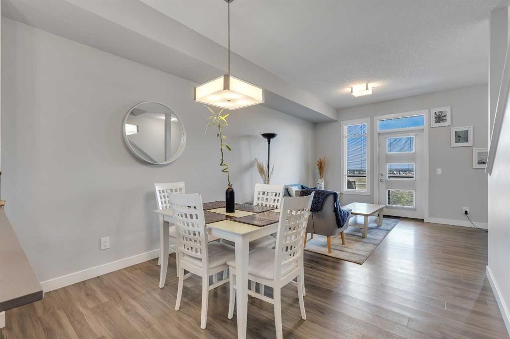 154 Seton Passage Se, Calgary, AB - Indoor Photo Showing Dining Room