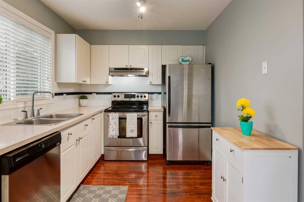 126 Harvest Gold Place Ne, Calgary, AB - Indoor Photo Showing Kitchen With Stainless Steel Kitchen With Double Sink