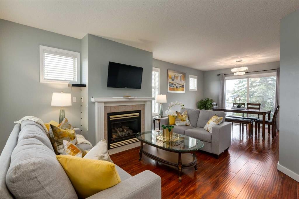 126 Harvest Gold Place Ne, Calgary, AB - Indoor Photo Showing Living Room With Fireplace