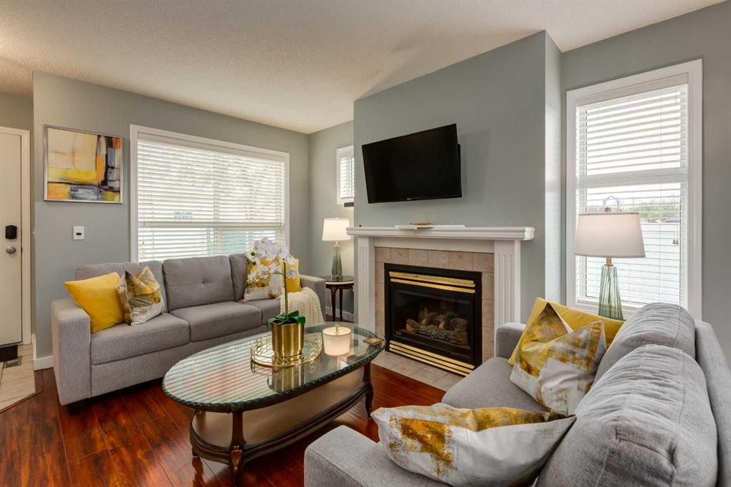126 Harvest Gold Place Ne, Calgary, AB - Indoor Photo Showing Living Room With Fireplace