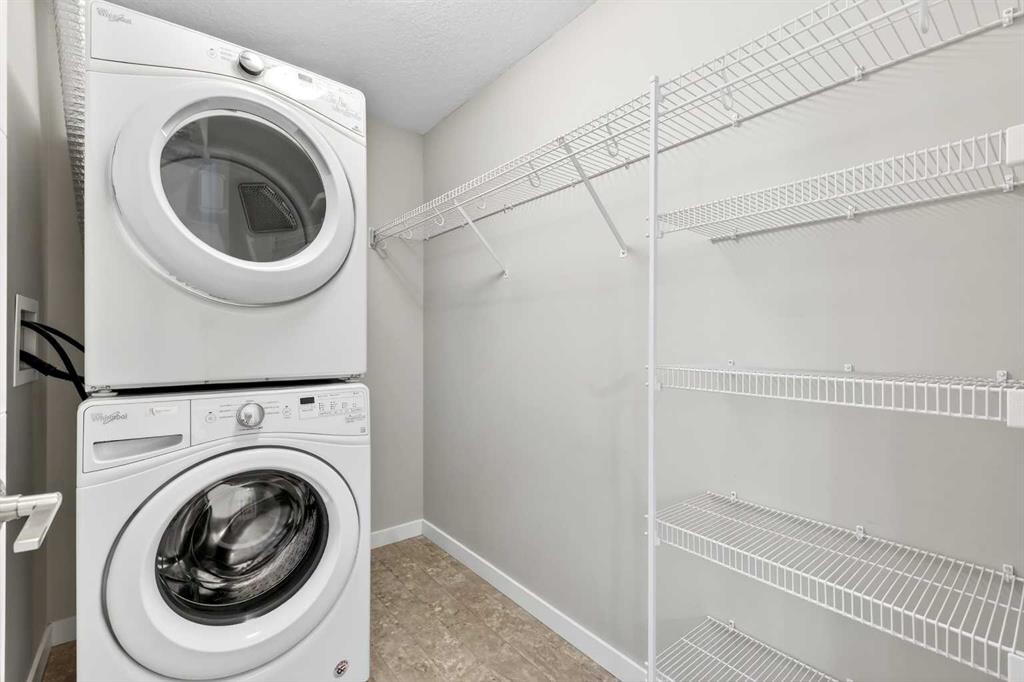 403-122 Mahogany Centre Se, Calgary, AB - Indoor Photo Showing Laundry Room