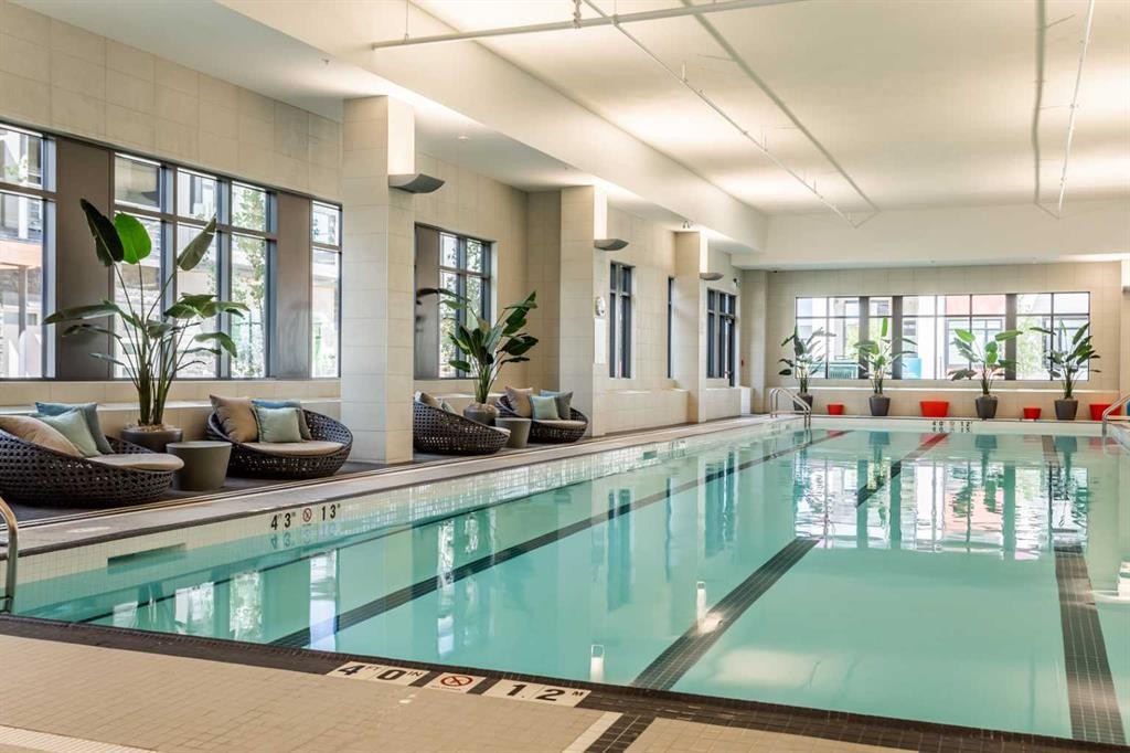 403-122 Mahogany Centre Se, Calgary, AB - Indoor Photo Showing Other Room With In Ground Pool