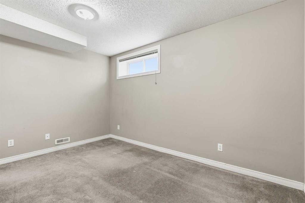 59 Taravista Street Ne, Calgary, AB - Indoor Photo Showing Other Room