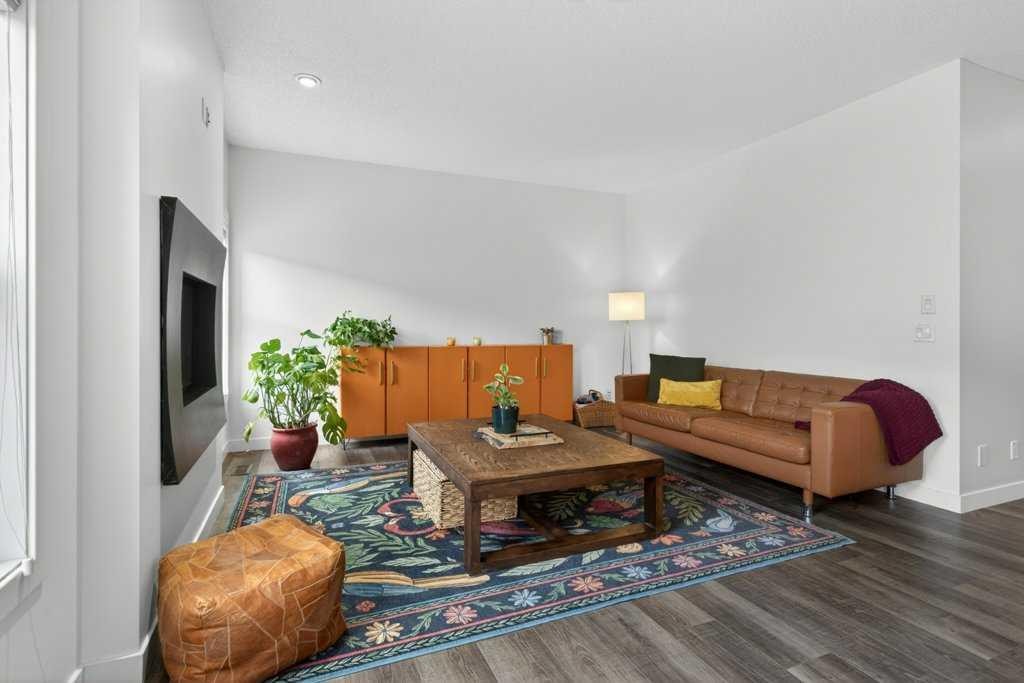 1091 Brightoncrest Green Se, Calgary, AB - Indoor Photo Showing Living Room
