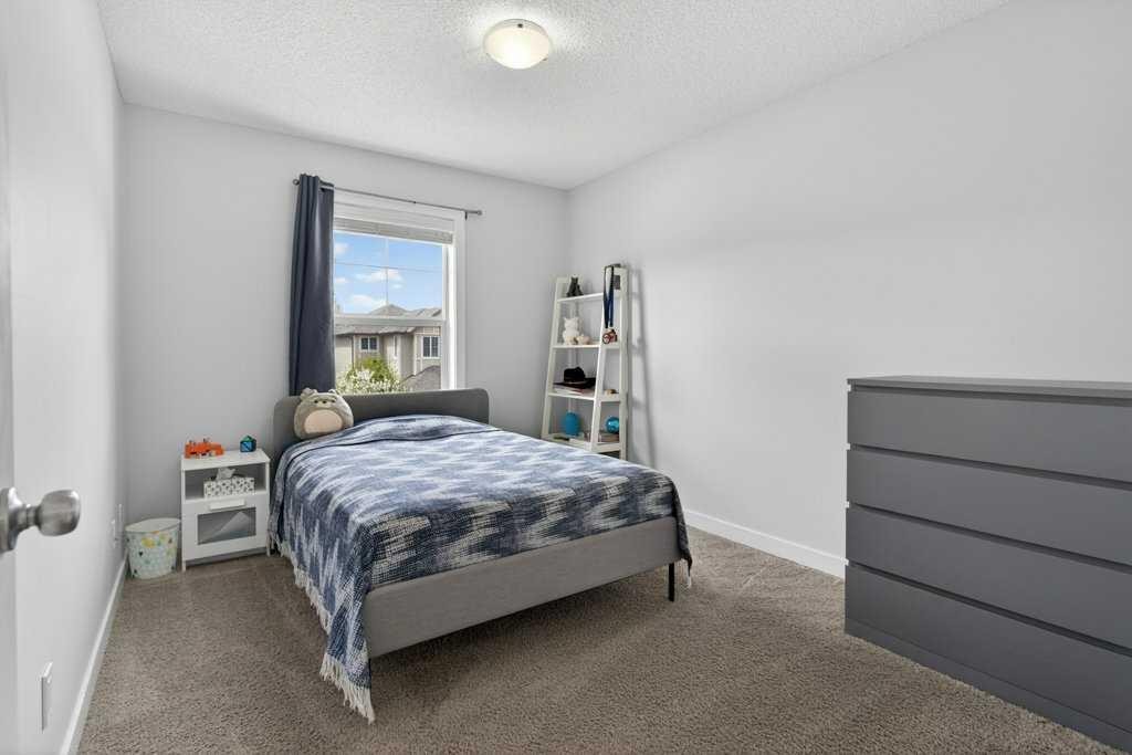 1091 Brightoncrest Green Se, Calgary, AB - Indoor Photo Showing Bedroom