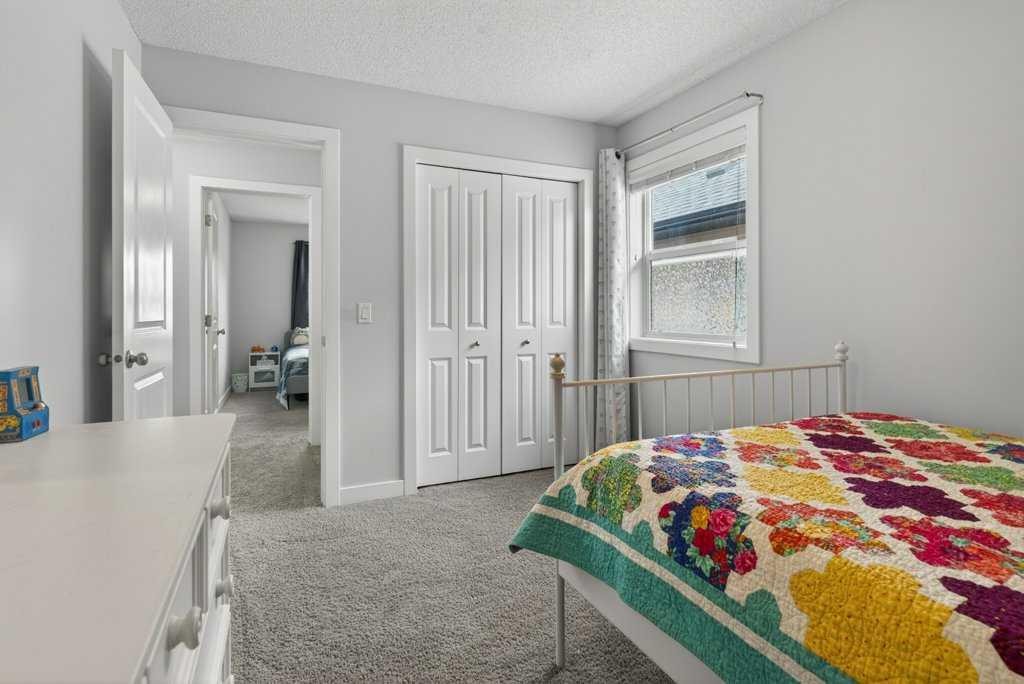 1091 Brightoncrest Green Se, Calgary, AB - Indoor Photo Showing Bedroom