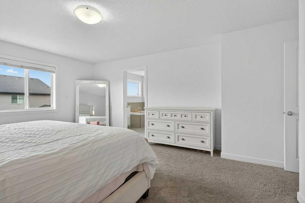 1091 Brightoncrest Green Se, Calgary, AB - Indoor Photo Showing Bedroom