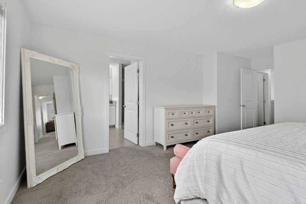 1091 Brightoncrest Green Se, Calgary, AB - Indoor Photo Showing Bedroom