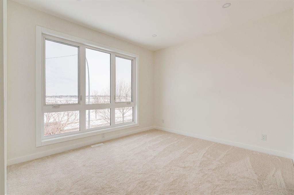 39A Moncton Road Ne, Calgary, AB - Indoor Photo Showing Other Room