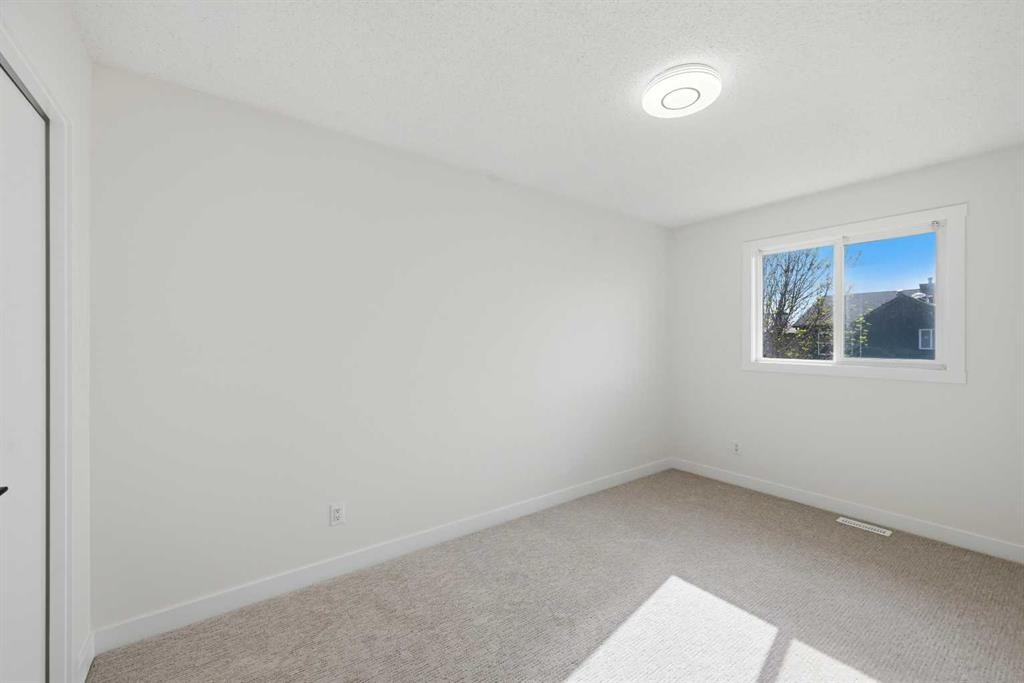 88 Saddletree Close Ne, Calgary, AB - Indoor Photo Showing Other Room