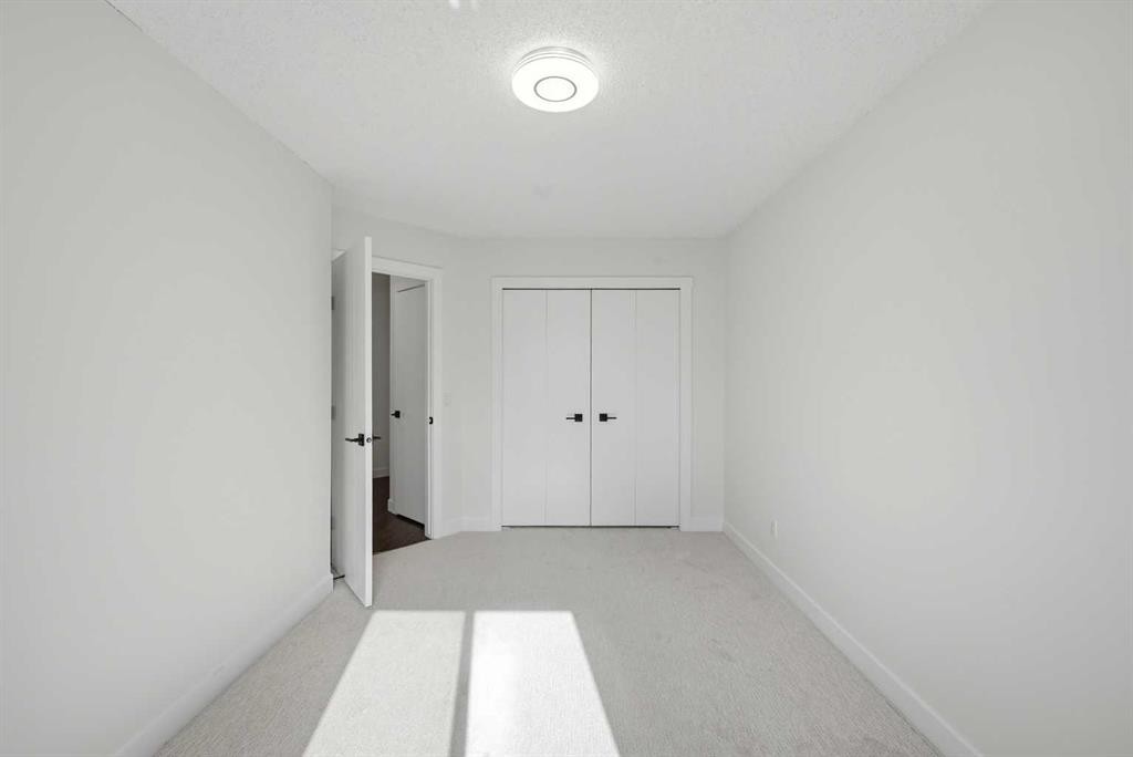 88 Saddletree Close Ne, Calgary, AB - Indoor Photo Showing Other Room