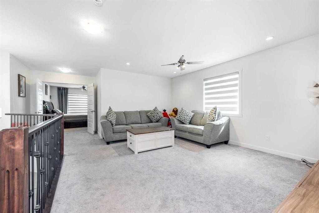 32 Saddlestone Way Ne, Calgary, AB - Indoor Photo Showing Living Room