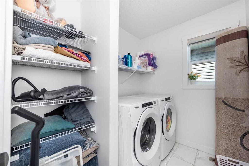 32 Saddlestone Way Ne, Calgary, AB - Indoor Photo Showing Laundry Room
