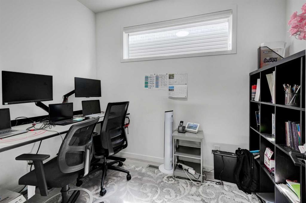 41 Copperhead Road Se, Calgary, AB - Indoor Photo Showing Office