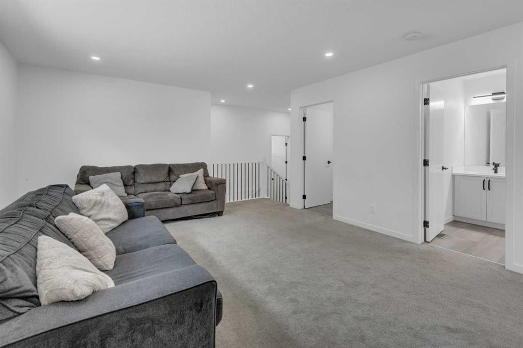 41 Copperhead Road Se, Calgary, AB - Indoor Photo Showing Living Room