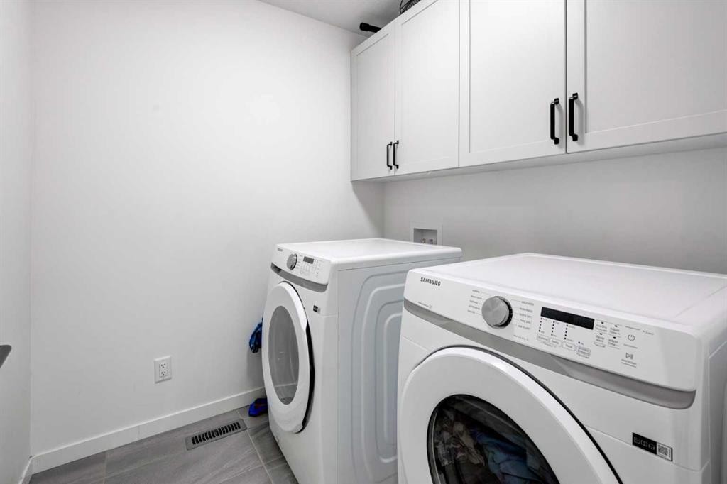 41 Copperhead Road Se, Calgary, AB - Indoor Photo Showing Laundry Room