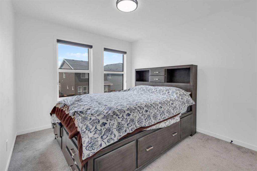 41 Copperhead Road Se, Calgary, AB - Indoor Photo Showing Bedroom