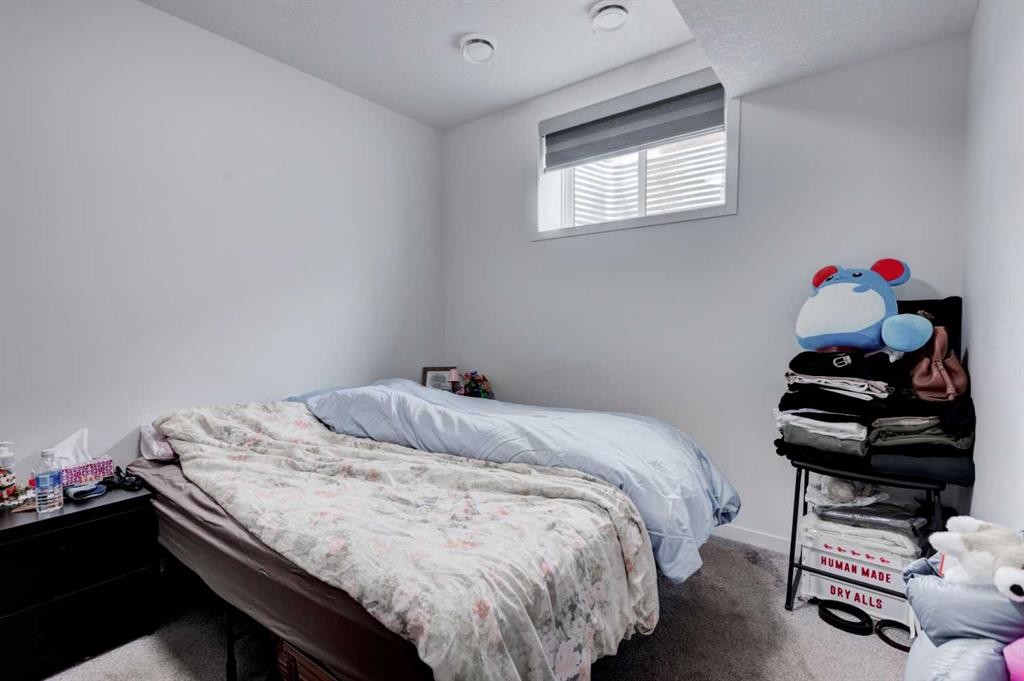 41 Copperhead Road Se, Calgary, AB - Indoor Photo Showing Bedroom
