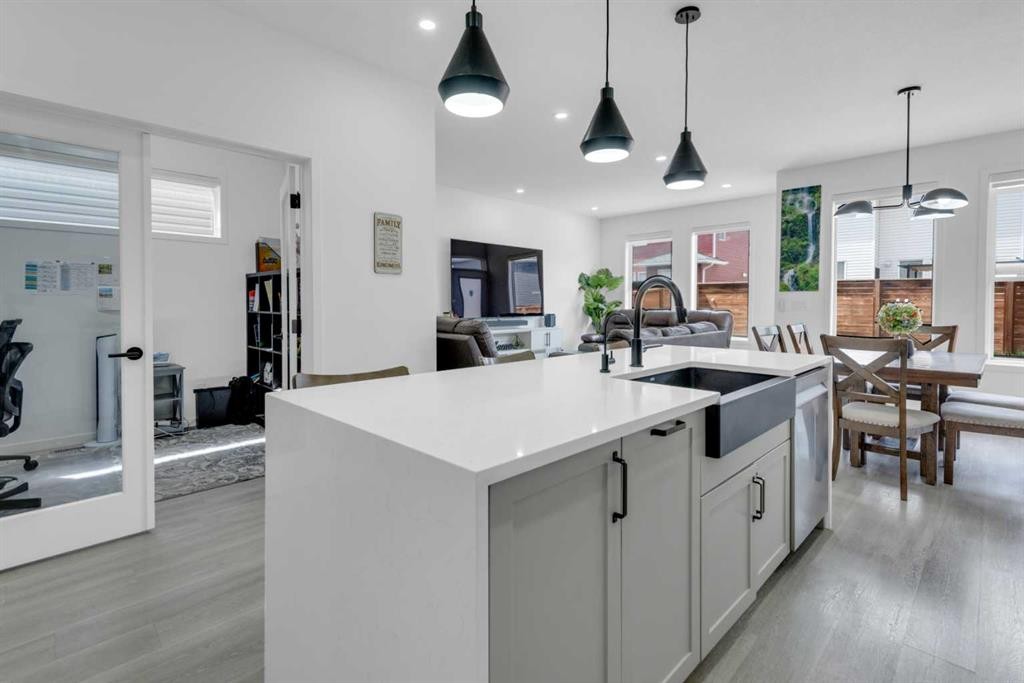 41 Copperhead Road Se, Calgary, AB - Indoor Photo Showing Kitchen With Double Sink