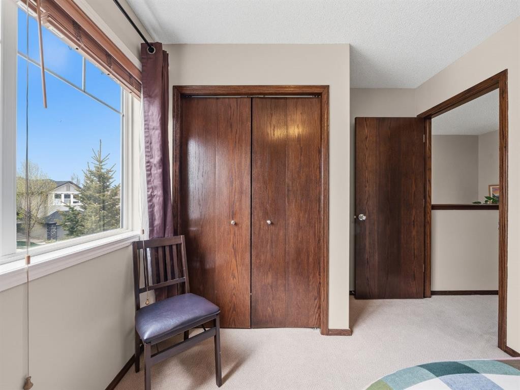 28 Cranberry Lane Se, Calgary, AB - Indoor Photo Showing Bedroom