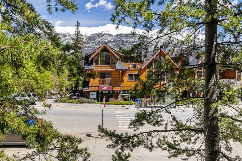 1003-70 Dyrgas Gate, Canmore, AB - Outdoor With Deck Patio Veranda