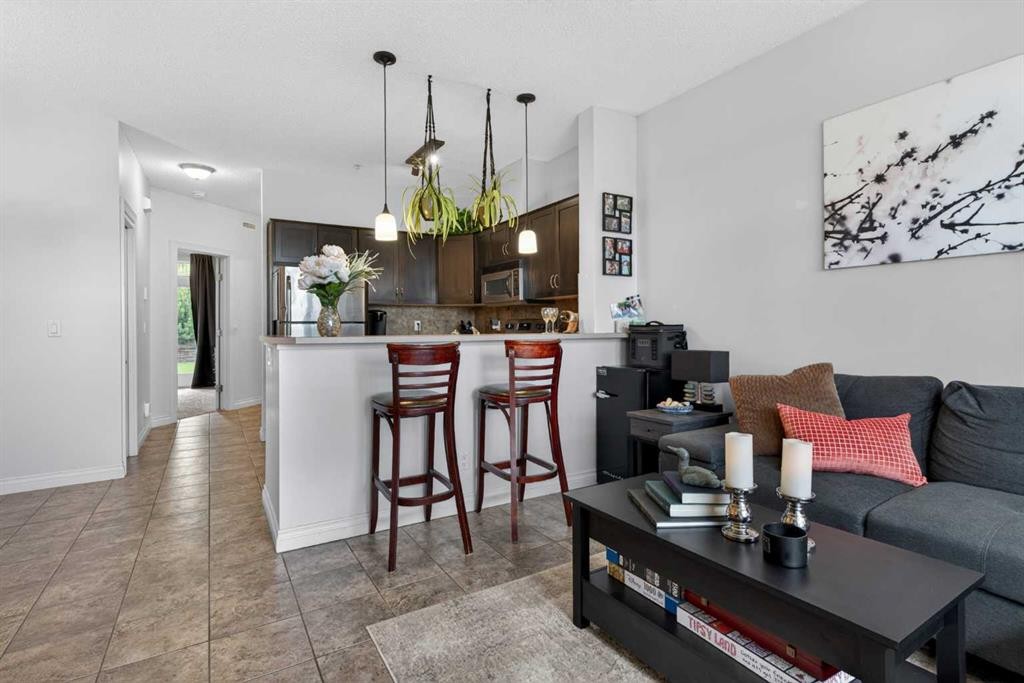 6-108 Rockyledge View Nw, Calgary, AB - Indoor Photo Showing Living Room