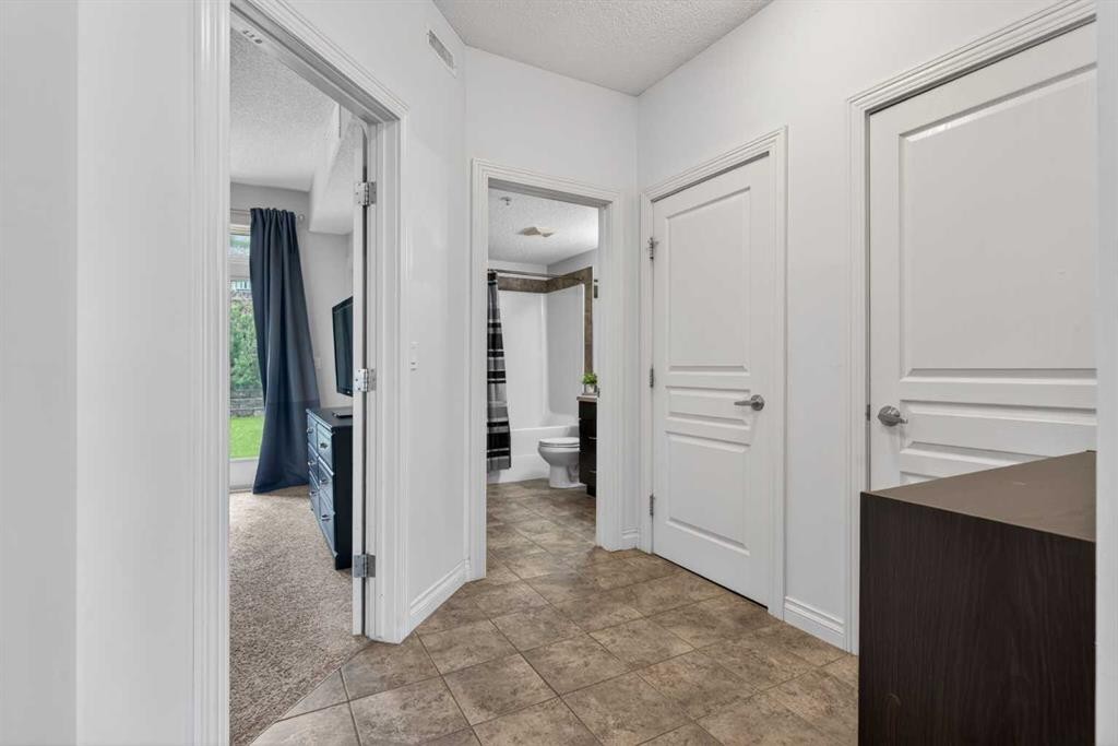 6-108 Rockyledge View Nw, Calgary, AB - Indoor Photo Showing Other Room
