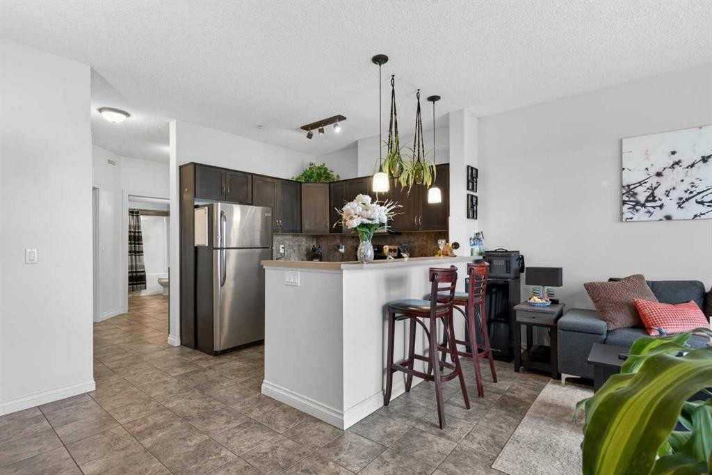 6-108 Rockyledge View Nw, Calgary, AB - Indoor Photo Showing Kitchen With Stainless Steel Kitchen