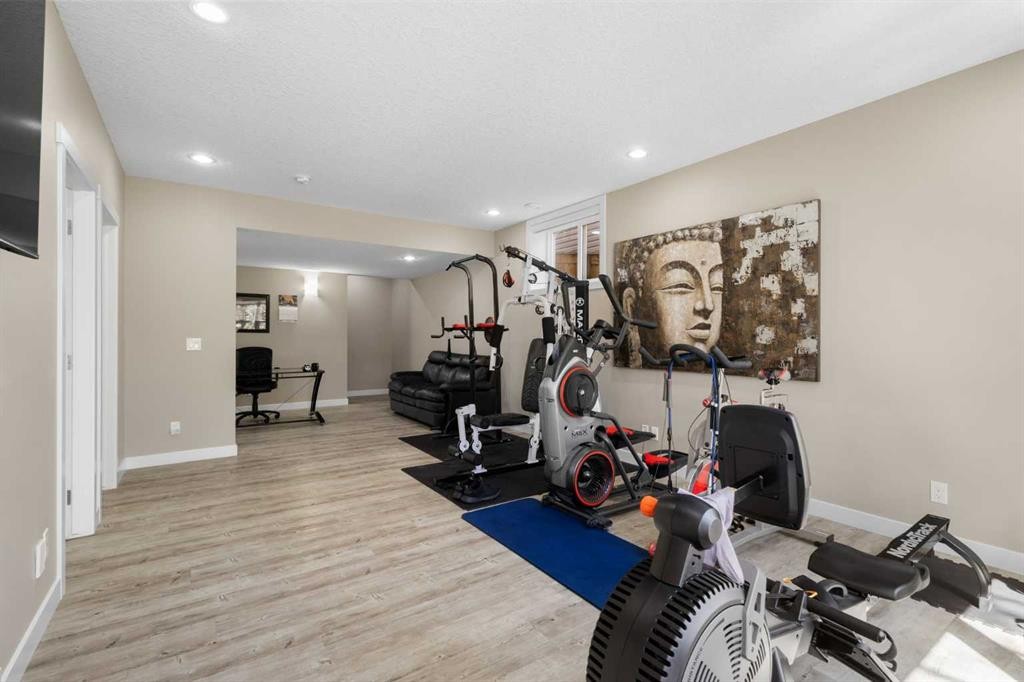 106 Cranarch Landing Se, Calgary, AB - Indoor Photo Showing Gym Room