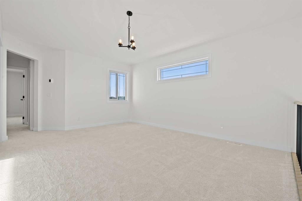 571 Buffaloberry Manor Se, Calgary, AB - Indoor Photo Showing Other Room