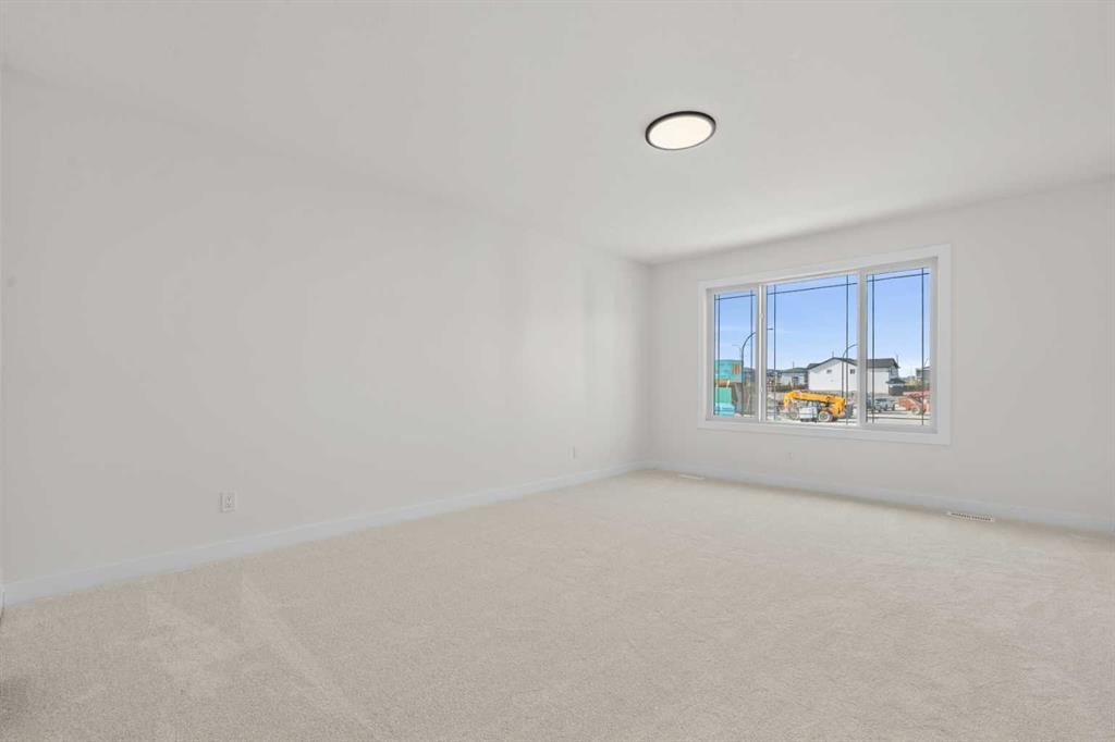 571 Buffaloberry Manor Se, Calgary, AB - Indoor Photo Showing Other Room