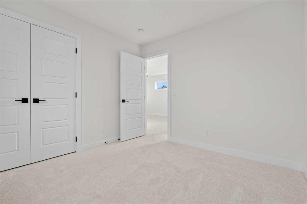 571 Buffaloberry Manor Se, Calgary, AB - Indoor Photo Showing Other Room