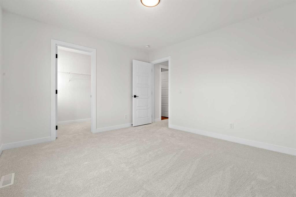 571 Buffaloberry Manor Se, Calgary, AB - Indoor Photo Showing Other Room