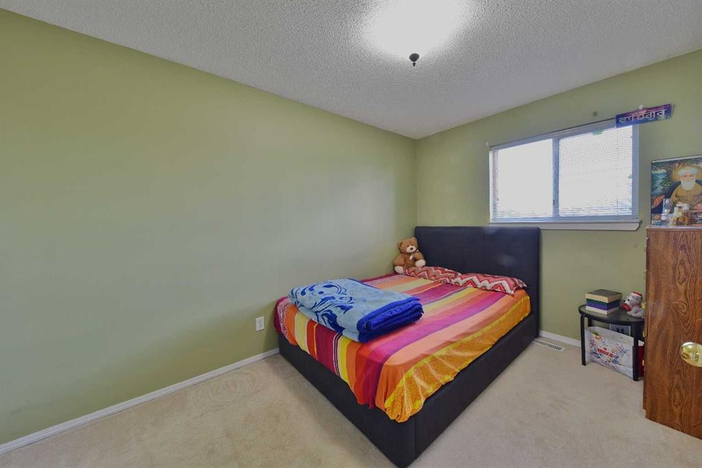 125 Costa Mesa Close Ne, Calgary, AB - Indoor Photo Showing Bedroom