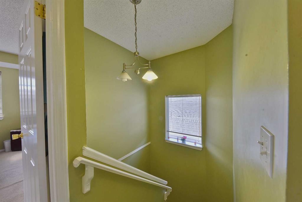 125 Costa Mesa Close Ne, Calgary, AB - Indoor Photo Showing Other Room