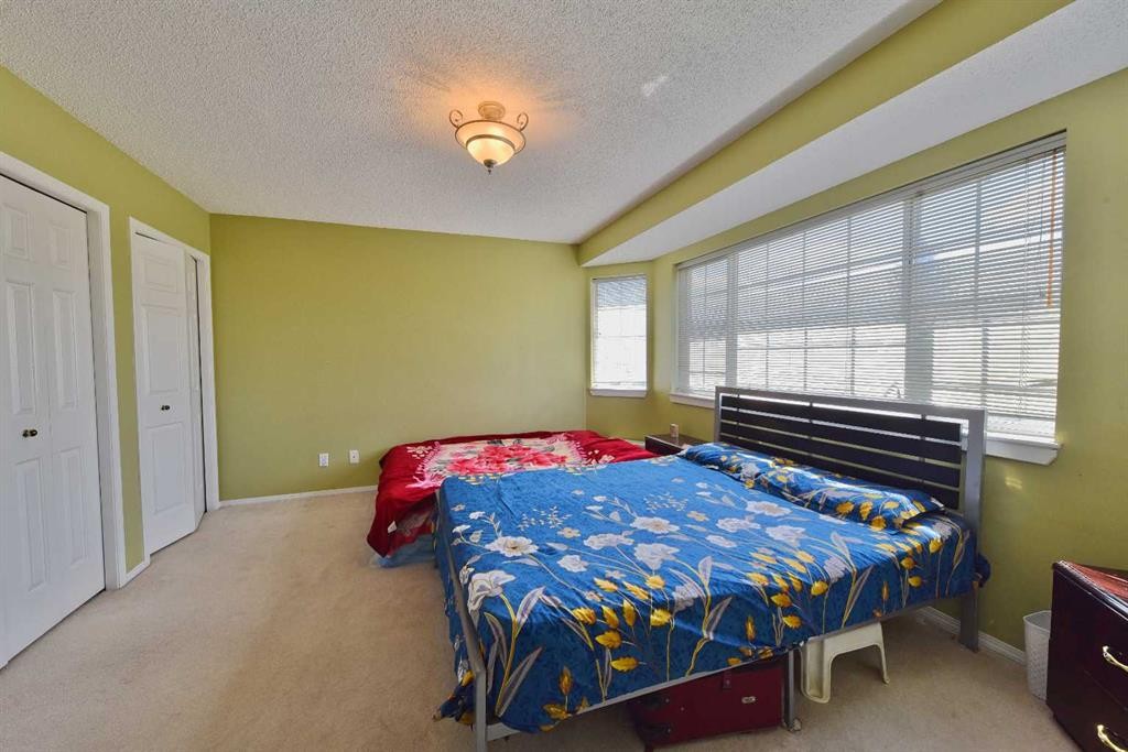 125 Costa Mesa Close Ne, Calgary, AB - Indoor Photo Showing Bedroom