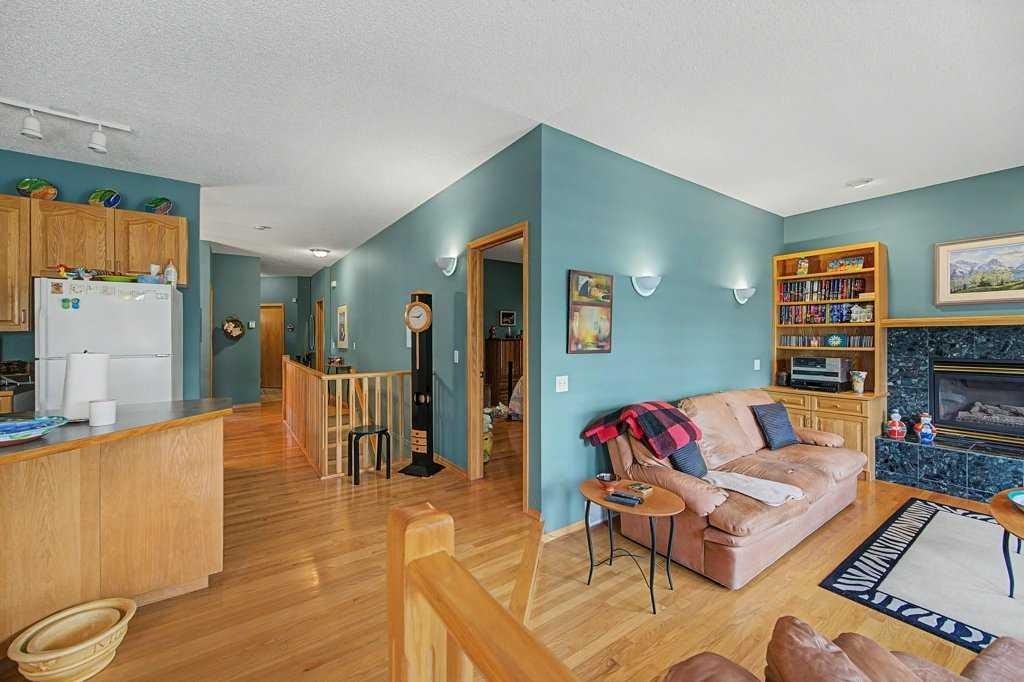 18 Prominence View Sw, Calgary, AB - Indoor With Fireplace