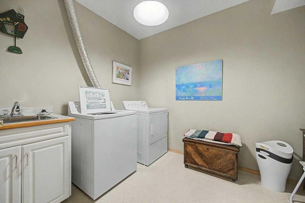 18 Prominence View Sw, Calgary, AB - Indoor Photo Showing Laundry Room