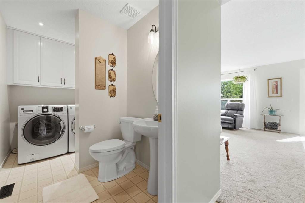 46 Somerside Place Sw, Calgary, AB - Indoor Photo Showing Laundry Room