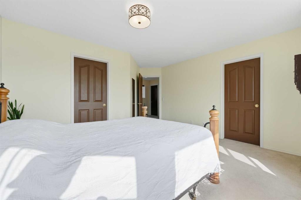 46 Somerside Place Sw, Calgary, AB - Indoor Photo Showing Bedroom